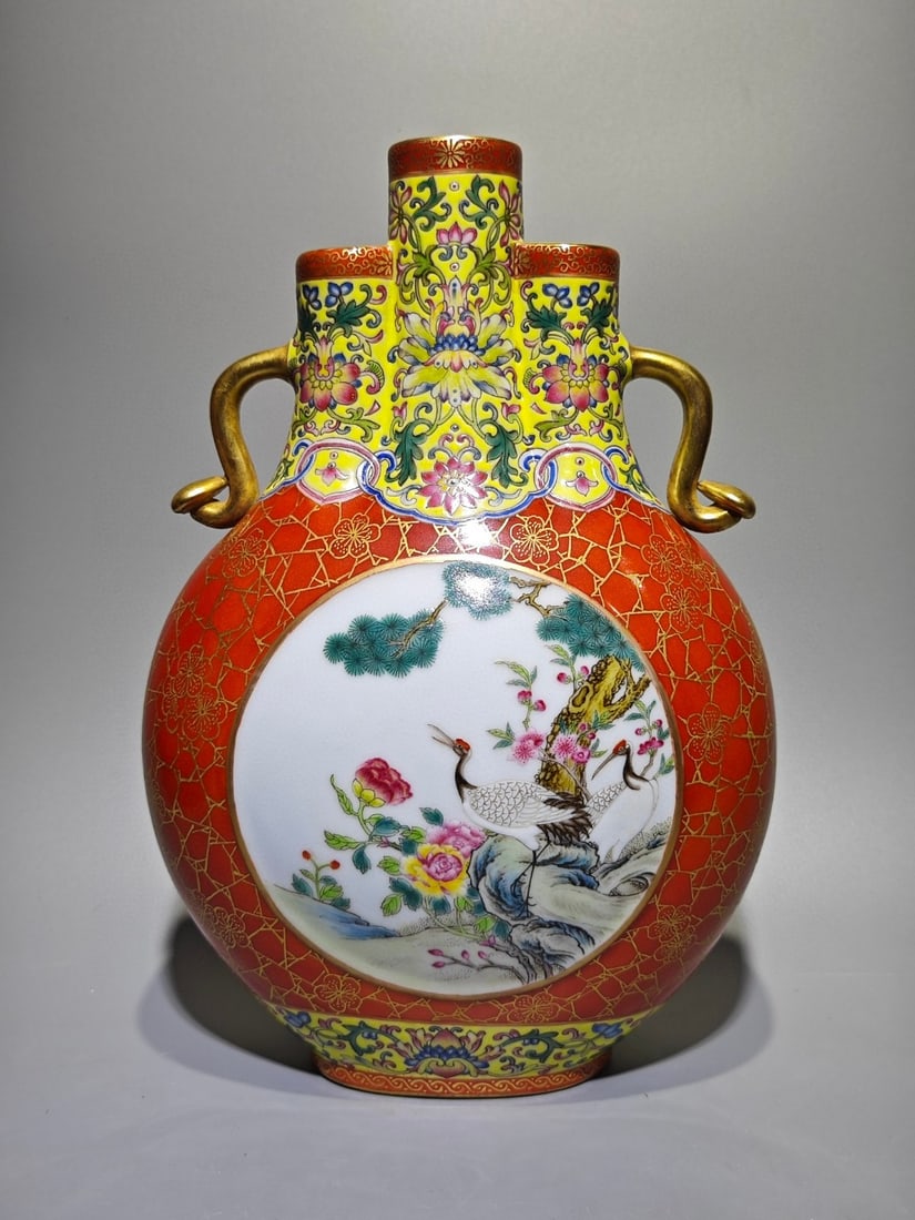 An Exquisite Famille-Rose Red Glazed Yellow Ground Painted Gold Flower and Bird Pattern Ruyi-Ears: An Exquisite Famille-Rose Red Glazed Yellow Ground Painted Gold Flower and Bird Pattern Ruyi-Ears Vase,Qing Dynasty,China,Qianlong Four-character Mark,Size:11.1inx7.7in 粉彩红釉
