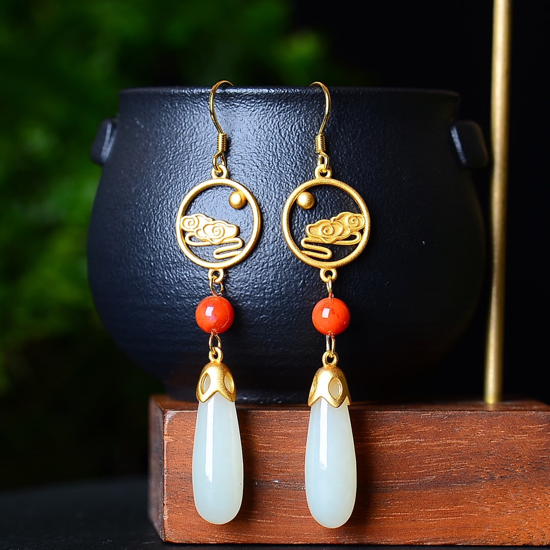 A Pair of Exquisite Sterling Silver-Gold Plated Inlaid White Jade Earrings: A Pair of Exquisite Sterling Silver-Gold Plated Inlaid White Jade Earrings,Size:8mmx26mm 一对纯银镀金镶白玉耳环