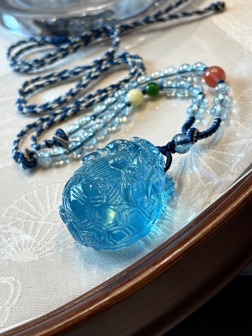 An Exquisite Aquamarine Auspicious Beast Pendant: An Exquisite Aquamarine Auspicious Beast Pendant,Size:27mmx23mmx17mm,Total Weight:19.3g 海蓝宝瑞兽吊坠