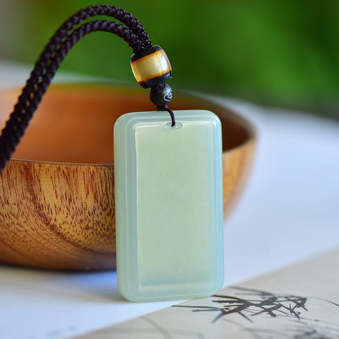 An Exquisite Greenish Jade Pendant: An Exquisite Greenish Jade Pendant,Size:50mmx30mmx9mm 寓意:保佑平安吉祥 事事顺利 青白玉吊坠