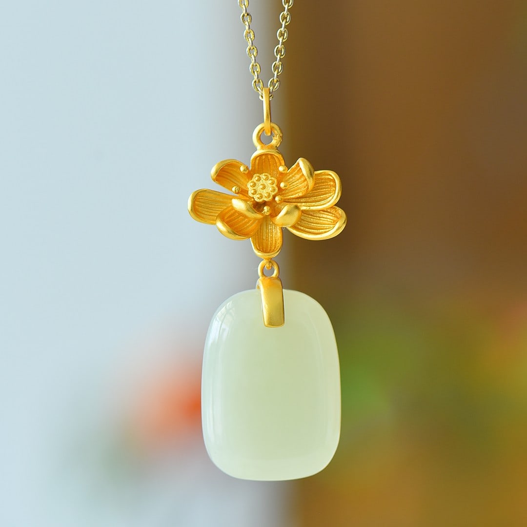 An Exquisite Sterling Silver-Gold Plated Inlaid White Jade Pendant: An Exquisite Sterling Silver-Gold Plated Inlaid White Jade Pendant 纯银镀金镶白玉吊坠