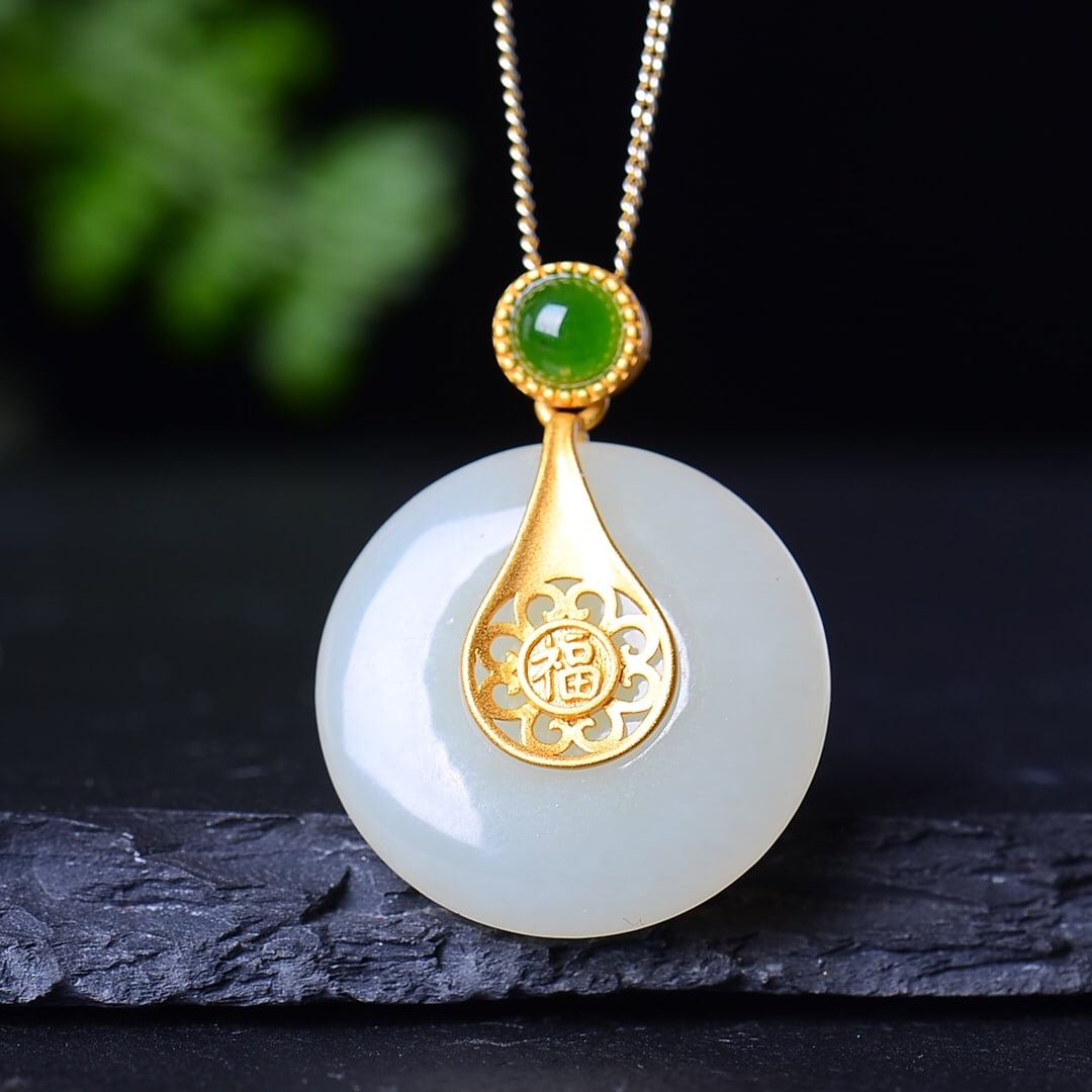 A Set of Fine Sterling Silver-Gold Plated Inlaid White Jade Jewelrys: A Set of Fine Sterling Silver-Gold Plated Inlaid White Jade Jewelrys,Size:(Earrings)10mmx10mm,(Pendant)23mmx23mm,(Ring)10mmx14mm 