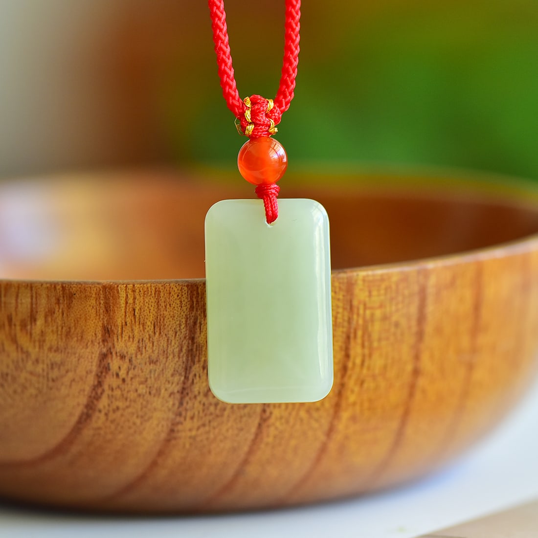 An Exquisite Greenish Jade Pendant: An Exquisite Greenish Jade Pendant,Size:25mmx15mm 寓意:吉祥 平安无事 青白玉吊坠
