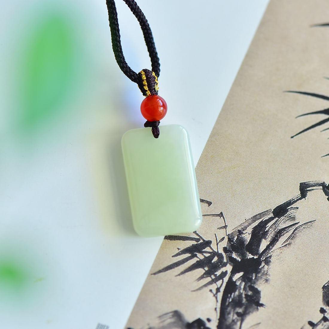 An Exquisite Greenish Jade Pendant: An Exquisite Greenish Jade Pendant,Size:25mmx15mm 寓意:吉祥 平安无事 青白玉吊坠