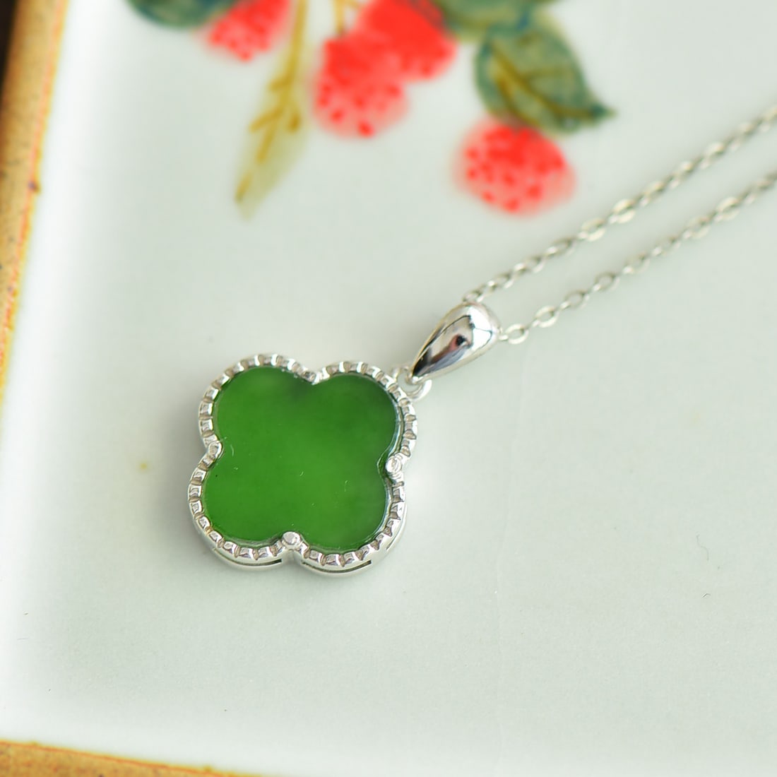 An Exquisite Sterling Silver-Gold Plated Inlaid White Jade Pendant: An Exquisite Sterling Silver-Gold Plated Inlaid White Jade Pendant 纯银镶白玉吊坠