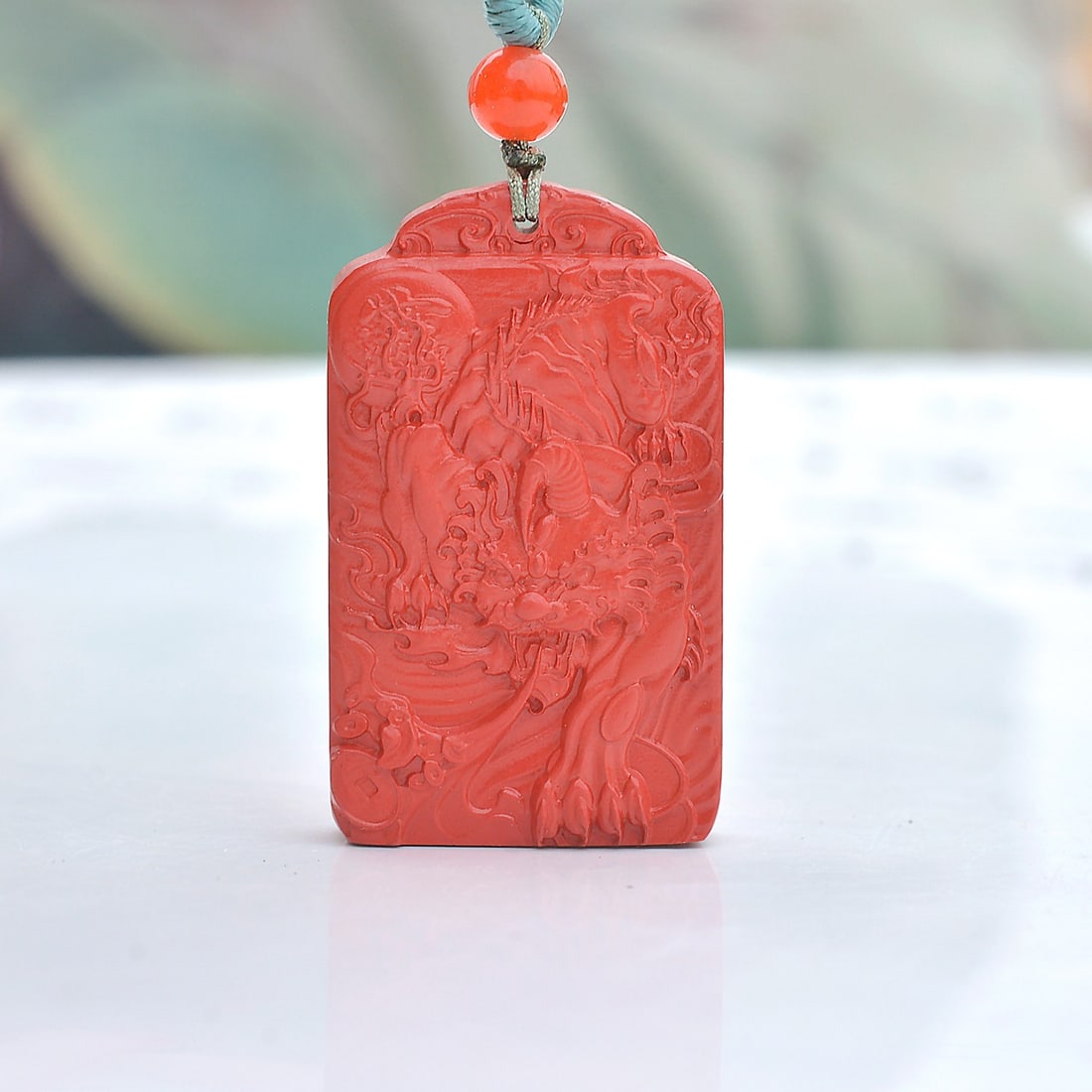 An Exquisite Cinnabar Auspicious Beast Pattern Pendant: An Exquisite Cinnabar Auspicious Beast Pattern Pendant,Size:19mmx33mm (寓意)吉祥招财喜庆、驱邪避凶、安神