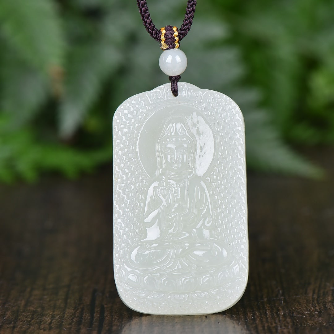 An Exquisite White Jade Avalokitesvara Pendant: An Exquisite White Jade Avalokitesvara Pendant,Size:30mmx50mmx8mm 寓意:吉祥 普度众生 保平安 