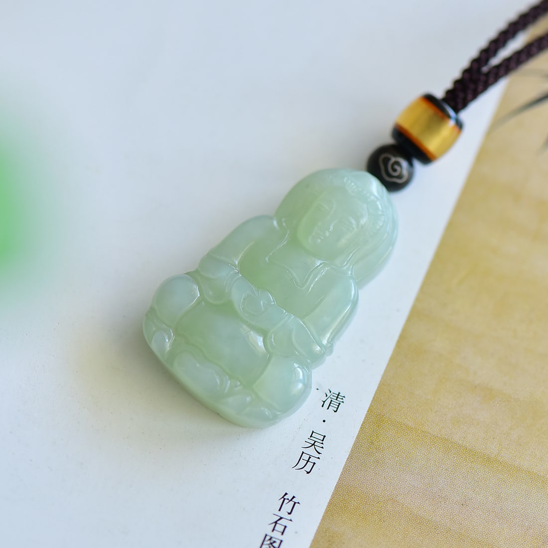 An Exquisite White Jade Avalokitesvara Pendant: An Exquisite White Jade Avalokitesvara Pendant,Size:37mmx23mm 