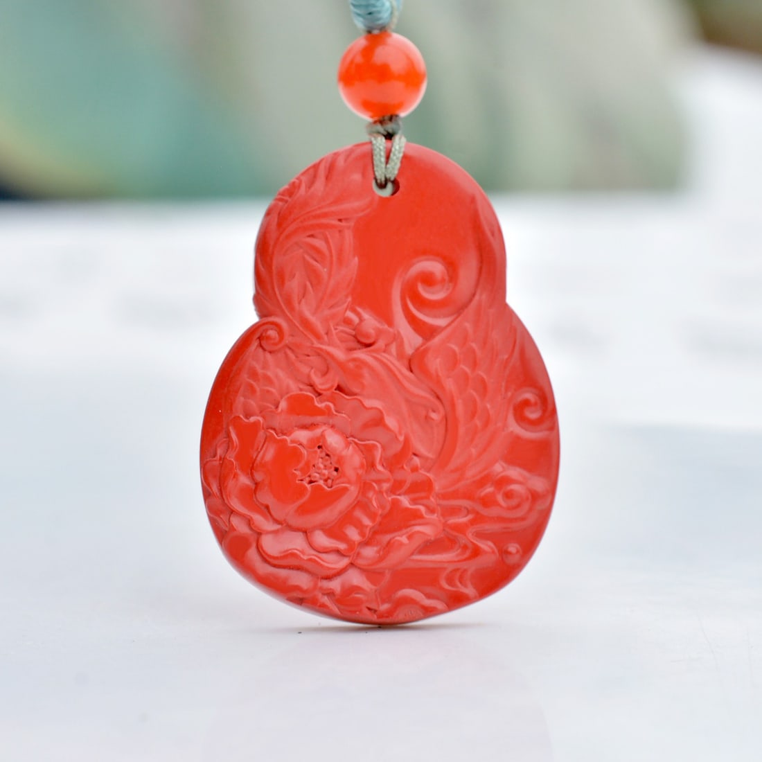 An Exquisite Cinnabar Flower and Bird Pattern Pendant: An Exquisite Cinnabar Flower and Bird Pattern Pendant,Size:20mmx27mm (寓意)吉祥招财喜庆、驱邪避凶、安神&