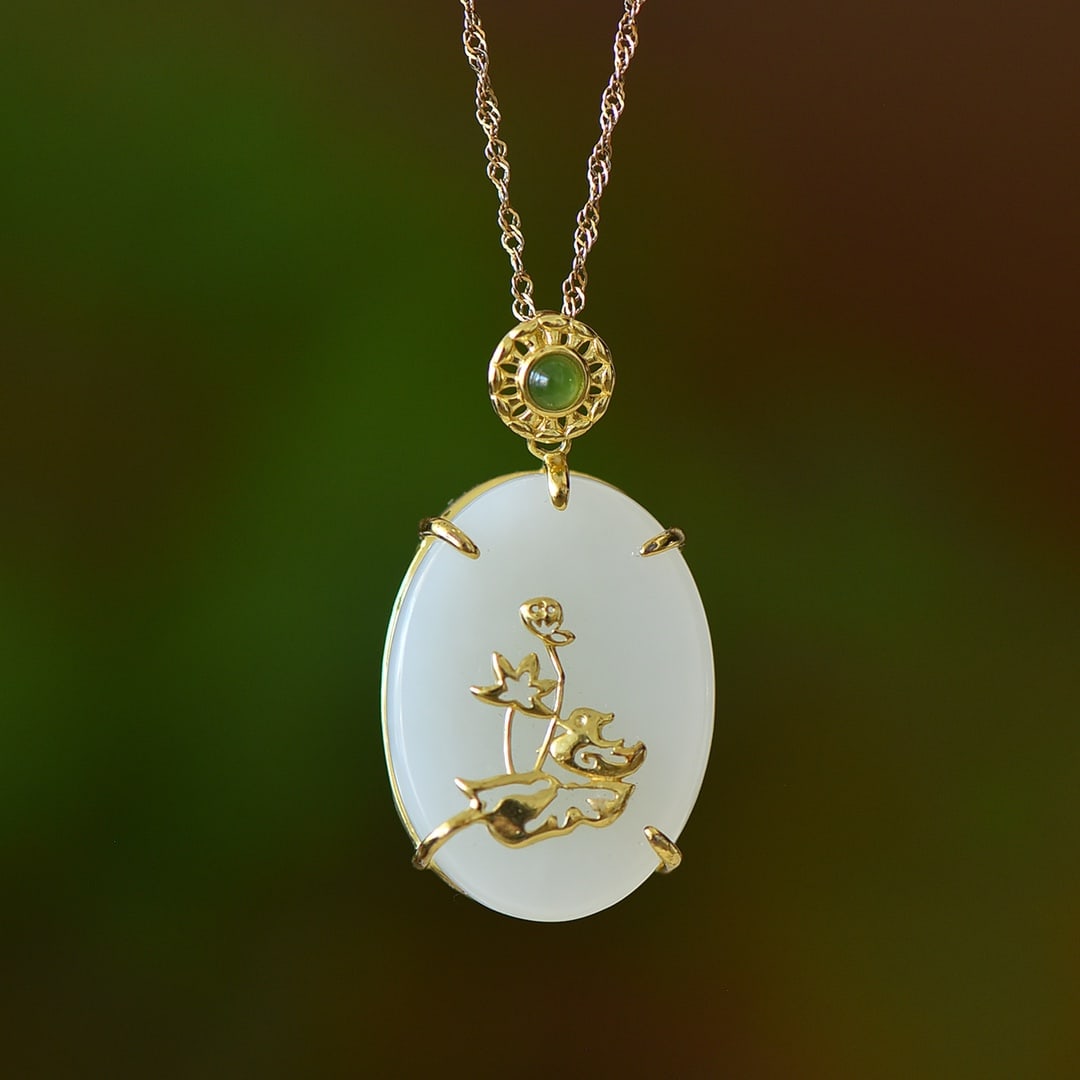 An Exquisite Sterling Silver-Gold Plated Inlaid White Jade Pendant: An Exquisite Sterling Silver-Gold Plated Inlaid White Jade Pendant,Size:20mmx27mm 纯银镀金镶白玉吊坠
