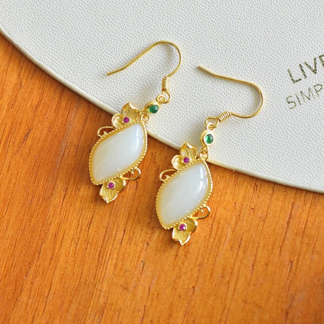 A Pair of Exquisite Sterling Silver-Gold Plated Inlaid White Jade Earrings: A Pair of Exquisite Sterling Silver-Gold Plated Inlaid White Jade Earrings,Size:9mmx15mm 一对纯银镀金镶白玉耳环