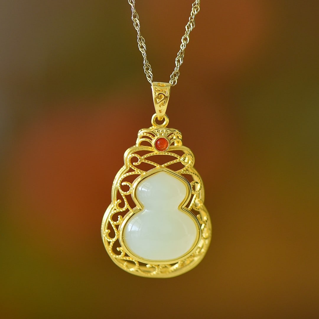 An Exquisite Sterling Silver-Gold Plated Inlaid White Jade Gourd Pendant: An Exquisite Sterling Silver-Gold Plated Inlaid White Jade Gourd Pendant 纯银镀金镶白玉葫芦吊坠