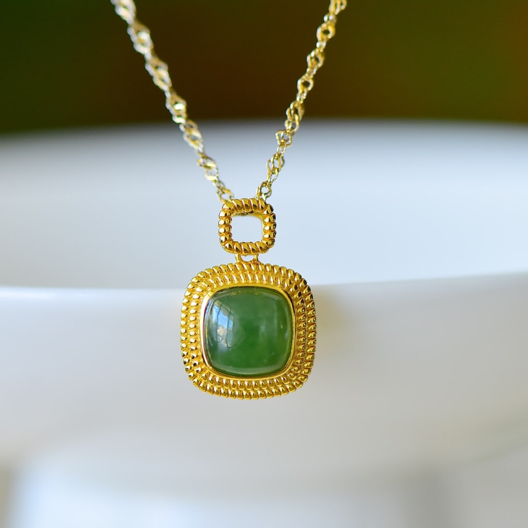 An Exquisite Sterling Silver-Gold Plated Inlaid White Jade Pendant: An Exquisite Sterling Silver-Gold Plated Inlaid White Jade Pendant,Size:8mmx8mm 纯银镀金镶白玉吊坠