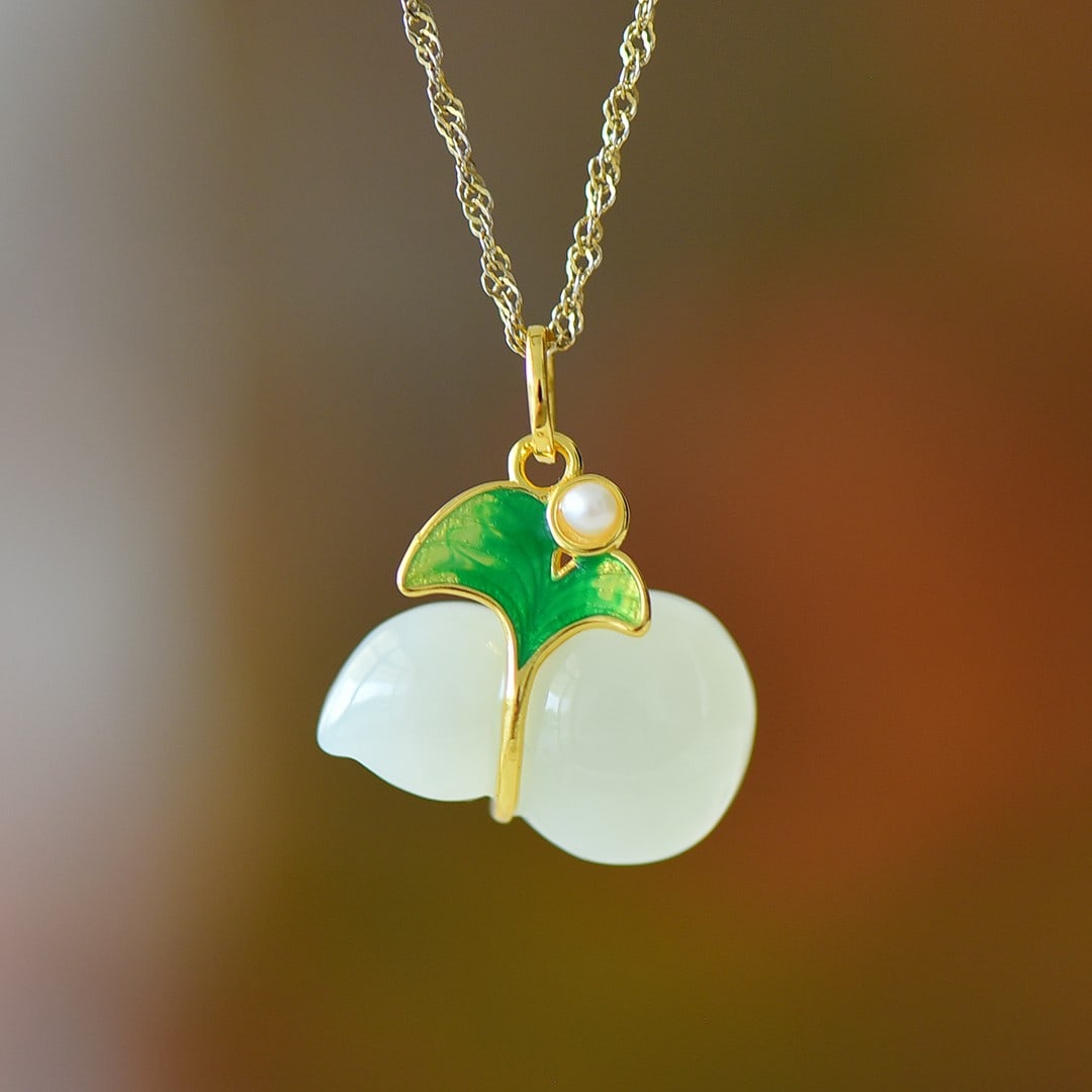 An Exquisite Sterling Silver-Gold Plated Inlaid White Jade Gourd Pendant: An Exquisite Sterling Silver-Gold Plated Inlaid White Jade Gourd Pendant 纯银镀金镶白玉葫芦吊坠