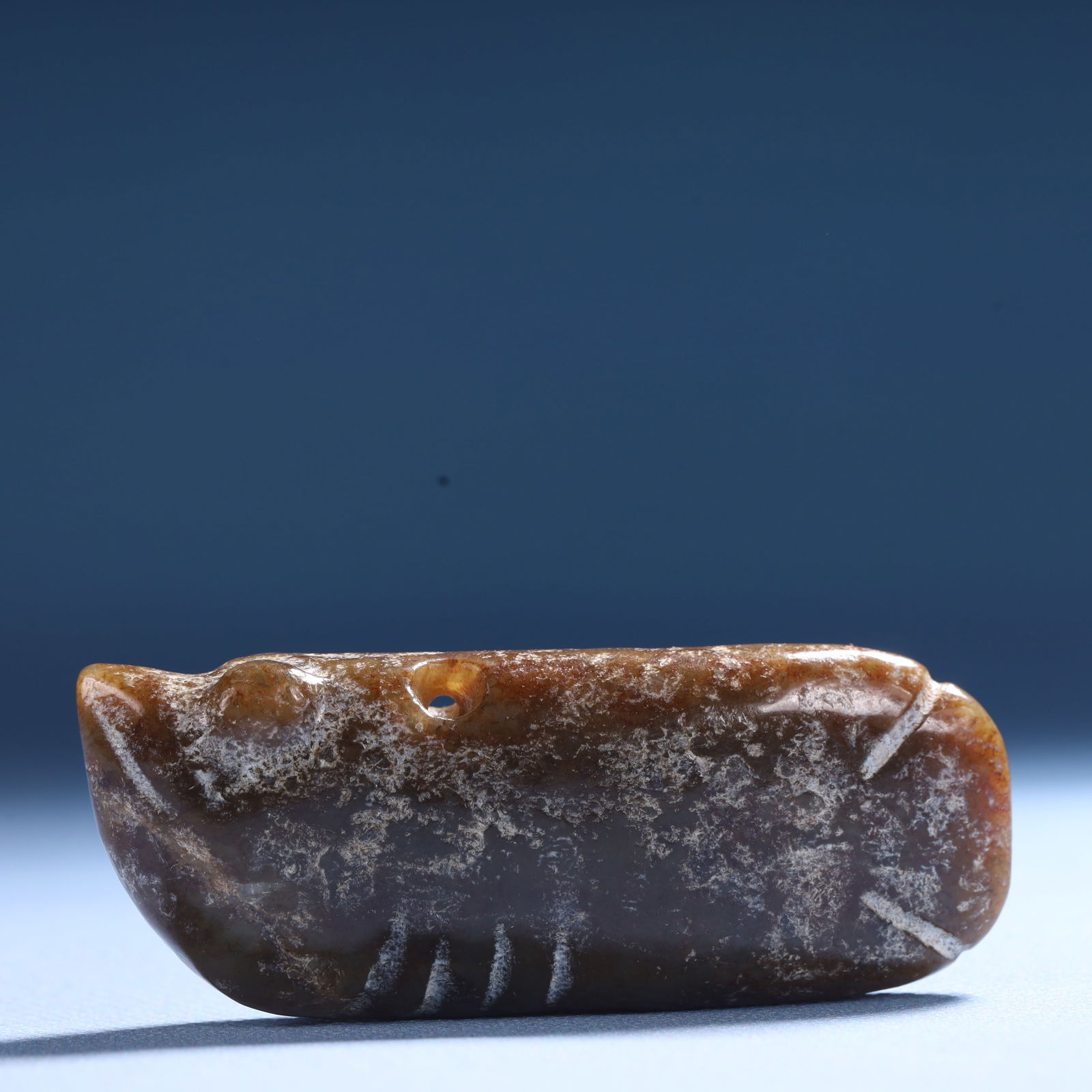 An Archaic Hongshan Culture Greenish Jade Fish Ornament: An Archaic Hongshan Culture Greenish Jade Fish Ornament,Ancient Time,China,Size:2.9inx1.2inx0.6in,Weight:69.3g 红山文化青白玉鱼摆件,中