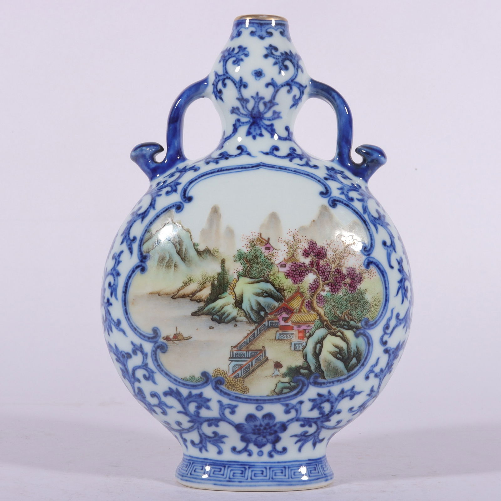 An Exquisite Famille-Rose Blue and White Painted Gold Lotus and Landscape Pattern Double-Ears Vase: An Exquisite Famille-Rose Blue and White Painted Gold Lotus and Landscape Pattern Double-Ears Vase,Qing Dynasty, China,Qianlong Six-character Mark,Size:7.7inx0.8inx5.1inx2.6in 