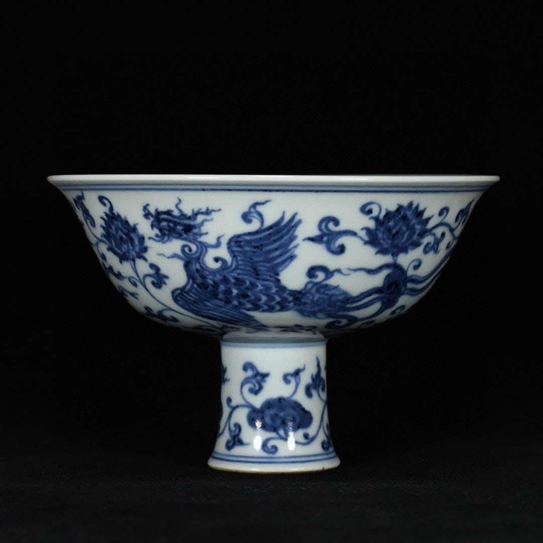 An Exquisite Blue and White Lotus and Phoenix Pattern Stem Bowl: An Exquisite Blue and White Lotus and Phoenix Pattern Stem Bowl,Ming Dynasty, China,Xuande Six-character Mark,Size:4.7inx6.3in 