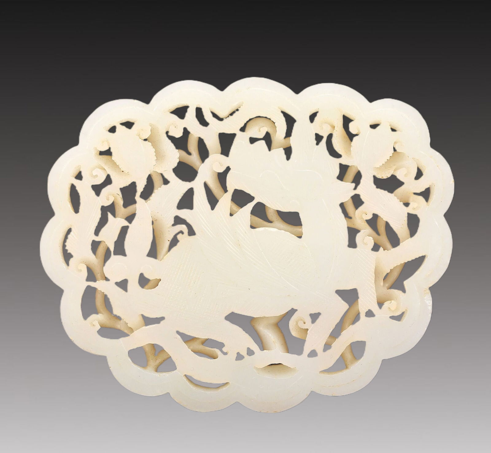 An Excellent White Jade 'Kylin' Pendant (1 of 5)