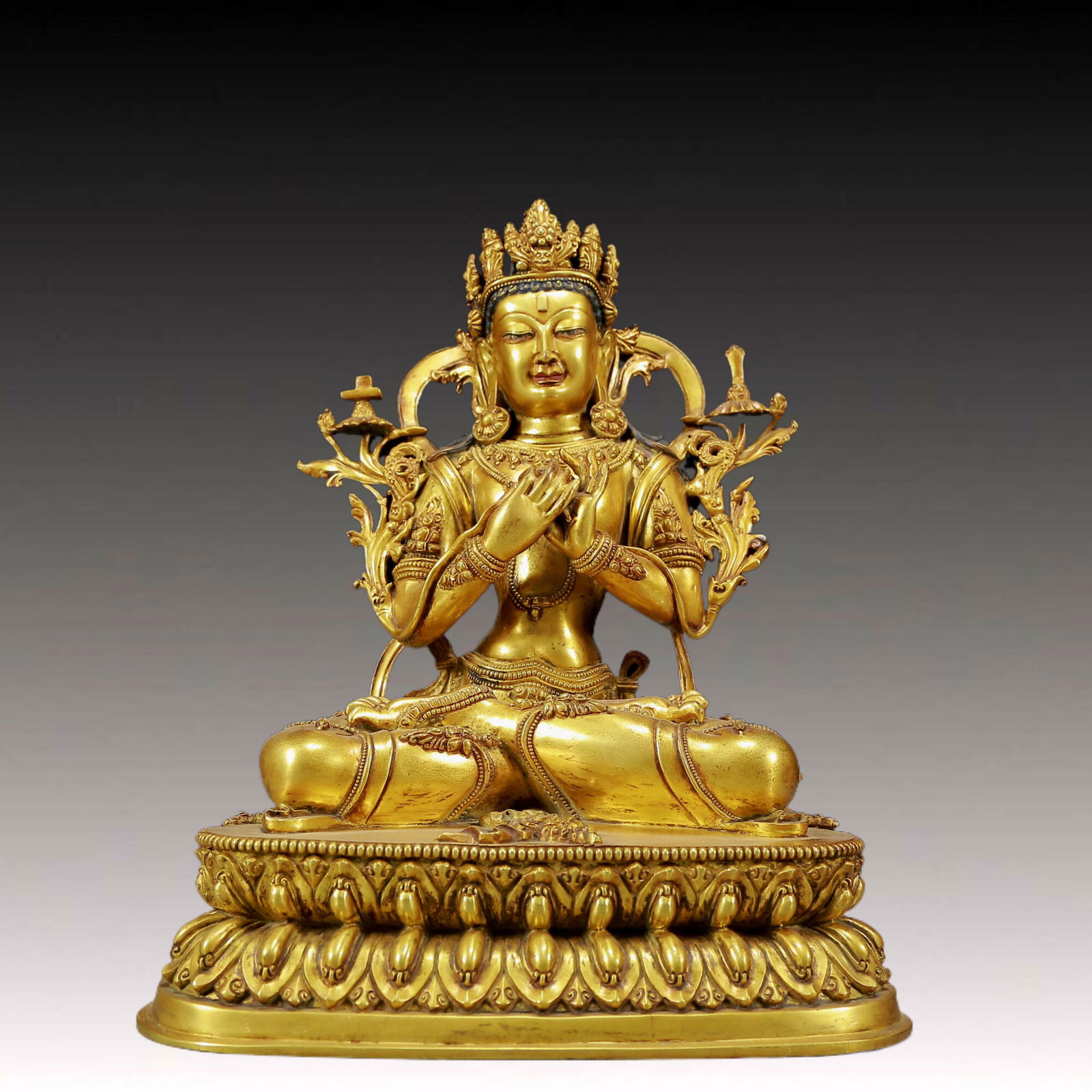 A Solemn Gilt Bronze Statue of Manjusri: A Solemn Gilt Bronze Statue of Manjusri,Ming Dynasty, China,Size:7.5inx5.5inx9.4in,Weight:3560g 铜鎏金文殊菩萨像，明代