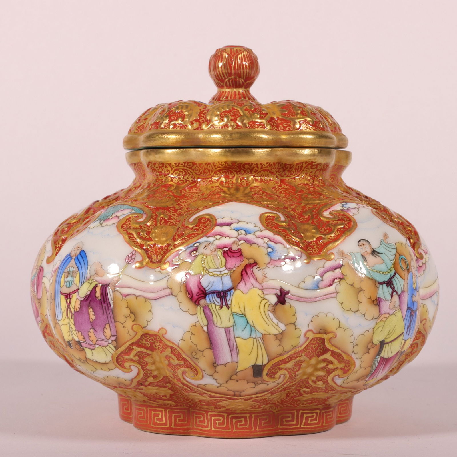 An Exquisite Enamel Iron-Red Painted Gold Auspicious Cloud and Arhat Pattern Tea Caddy: An Exquisite Enamel Iron-Red Painted Gold Auspicious Cloud and Arhat Pattern Tea Caddy,Qing Dynasty, China,Qianlong Six-character Mark,Size:4.7inx4.7in 