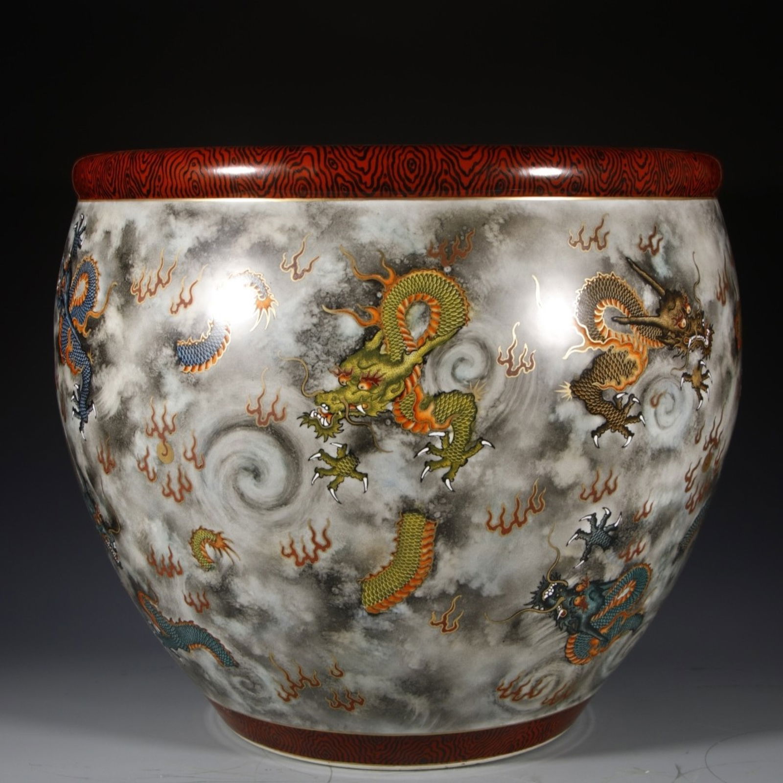 A Huge Imitation Wood Grain Glazed Famille-Rose Painted Gold Auspicious Cloud and Dragon Pattern Vat: A Huge Imitation Wood Grain Glazed Famille-Rose Painted Gold Auspicious Cloud and Dragon Pattern Vat, Qing Dynasty, China,Qianlong Four-character Mark,Size:19.3inx21.7inx12.6in 