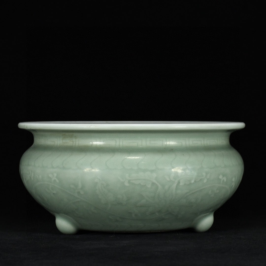 An Exquisite Longquan yao Celadon Glazed Lotus Pattern Tripod Censer (1 of 9)