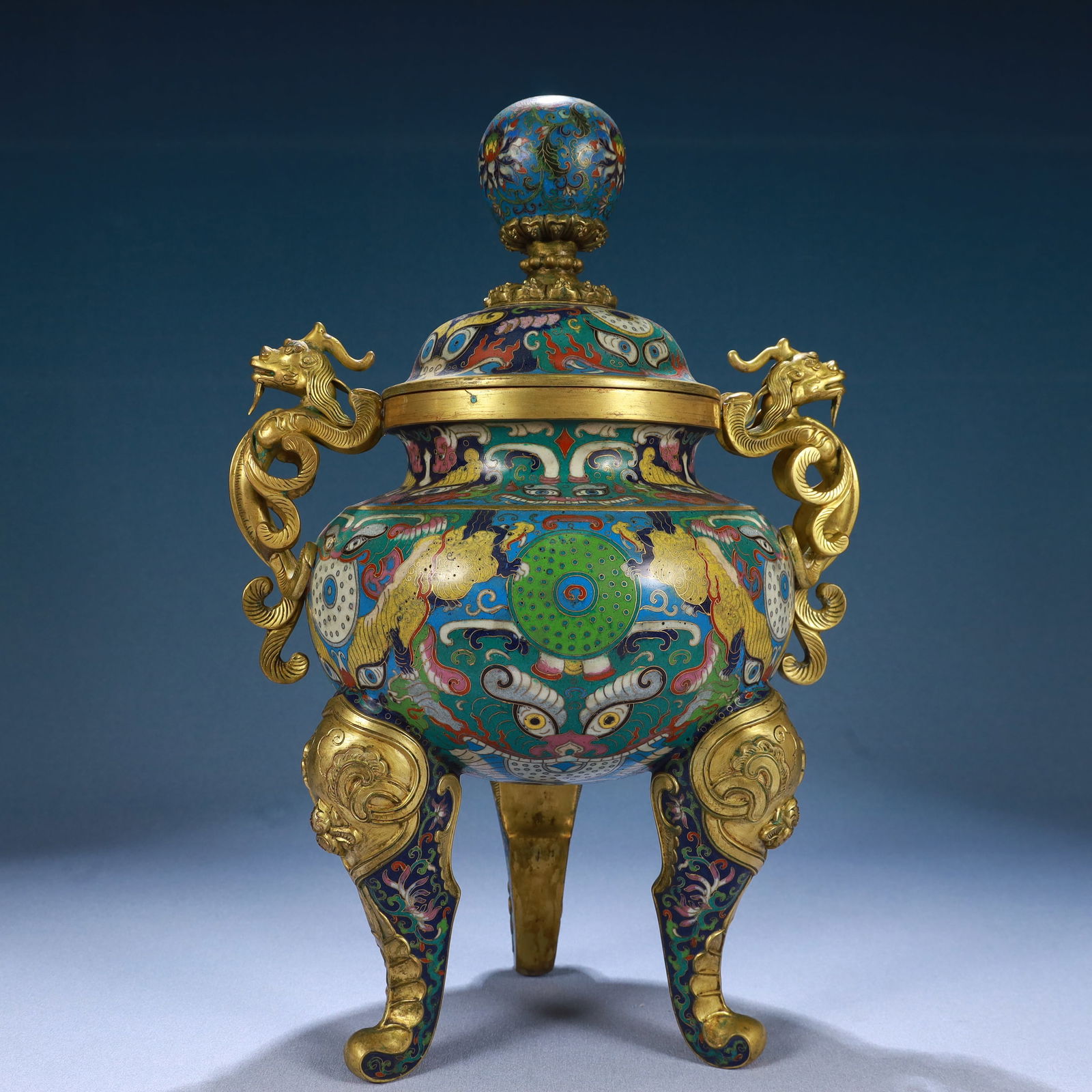 A Huge Cloisonne Beast-Face Pattern Dragon-Ears Tripod Censer: A Huge Cloisonne Beast-Face Pattern Dragon-Ears Tripod Censer,Qing Dynasty, China,Qianlong Four-character Mark,Size:15.9inx10.4in,Weight:3850g 景泰蓝兽面纹龙&