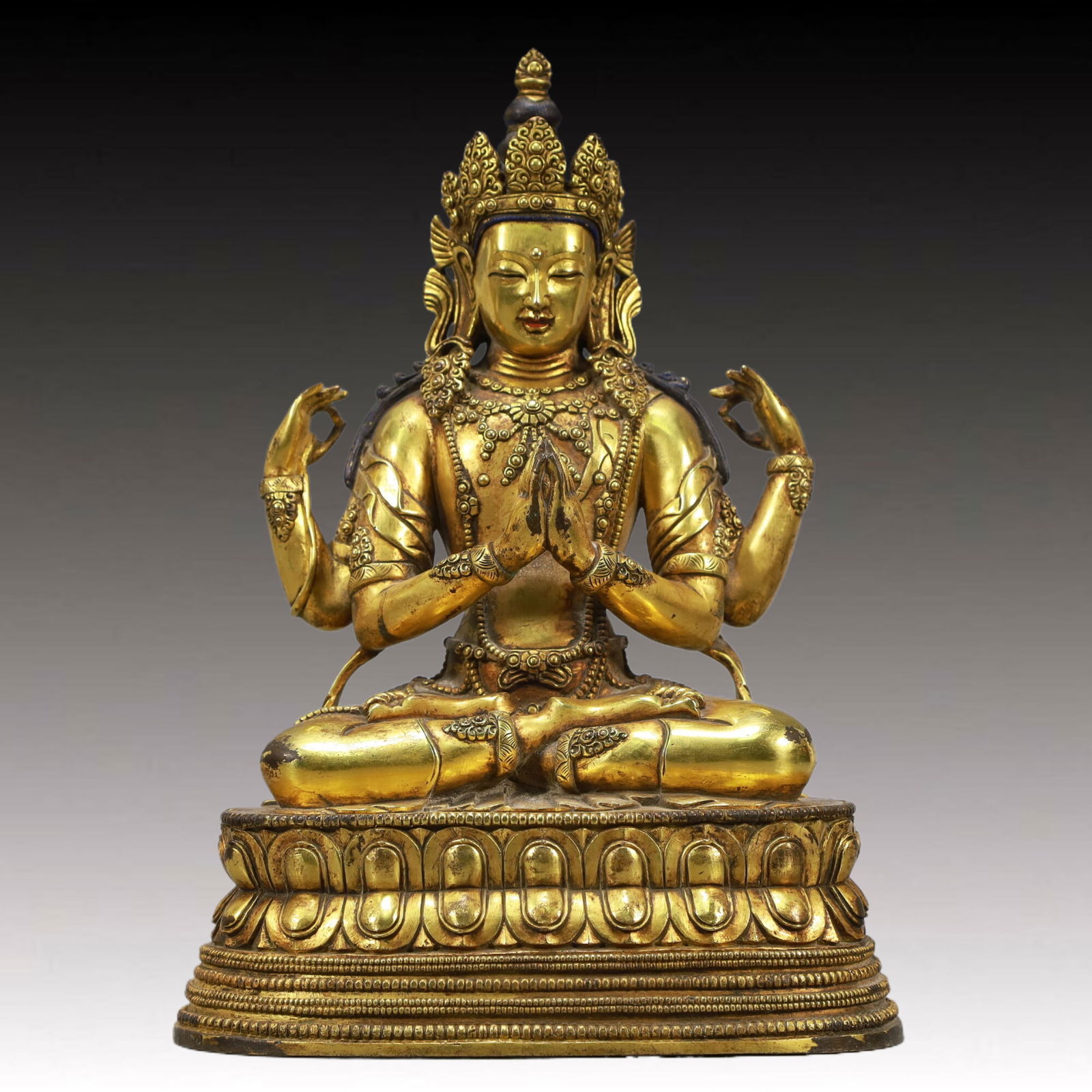 A Solemn Gilt Bronze Statue of Four-arms Guanyin (1 of 8)