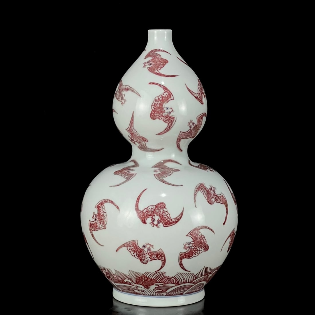 An Exquisite Underglaze-Red Seawater and Bats Pattern Gourd-Shaped Vase: An Exquisite Underglaze-Red Seawater and Bats Pattern Gourd-Shaped Vase,Qing Dynasty, China,Kangxi Six-character Mark,Size:8.3inx4.3in 