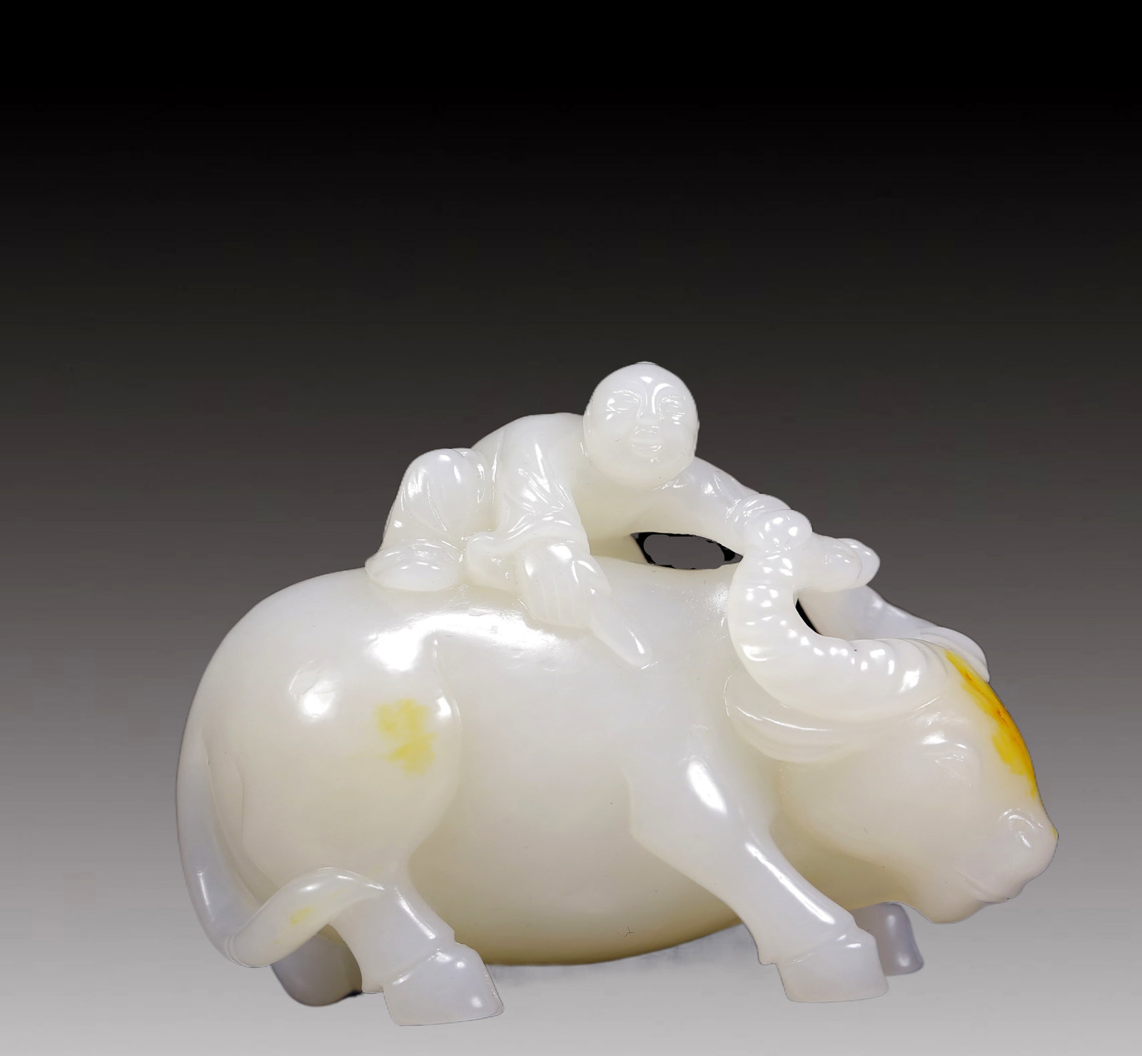 An Exquisite White Jade Figure Riding Buffalo Ornament (1 of 7)