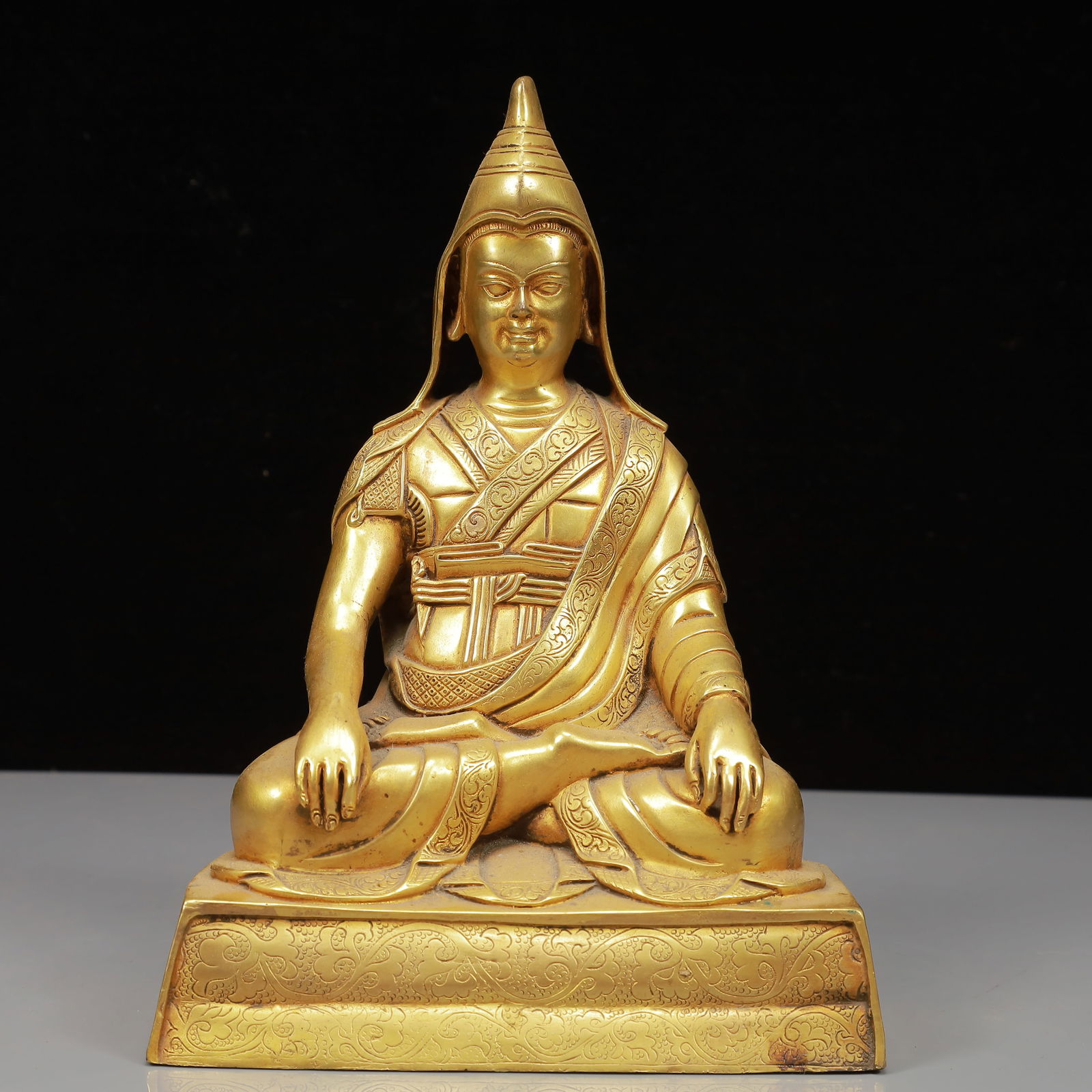 A Solemn Gilt Bronze Statue of Tsongkhapa: A Solemn Gilt Bronze Statue of Tsongkhapa,Ming Dynasty, China,Yongle Six-character Mark,Size:6.3inx4.3inx9.1in,Weight:2600g 铜鎏金宗喀巴像,中国