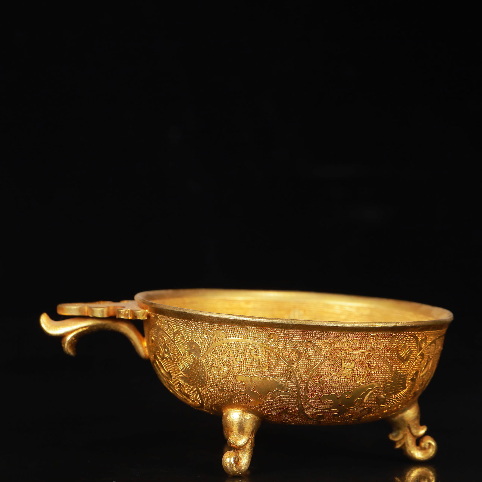 An Exquisite Gilt Bronze Flower and Bird Pattern Tripod Cup: An Exquisite Gilt Bronze Flower and Bird Pattern Tripod Cup,Qing Dynasty,China,Size:5.1inx3.9inx2in,Weight:256g 铜鎏金花鸟纹三足杯,中国