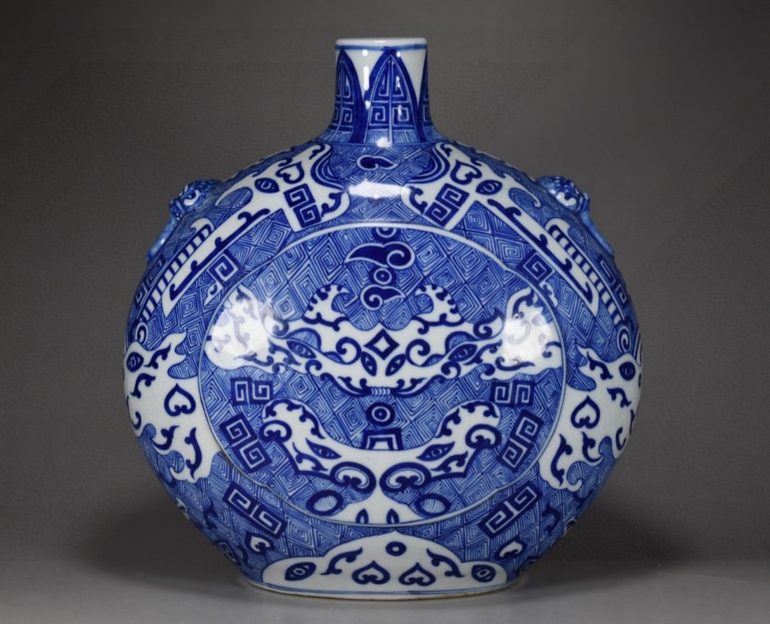 A Rare Blue and White Beast-Face Pattern Beast-Ears Vase: A Rare Blue and White Beast-Face Pattern Beast-Ears Vase,Qing Dynasty, China,Qianlong Six-character Mark,Size:11.8inx11in 青花兽面纹兽耳瓶,中Þ