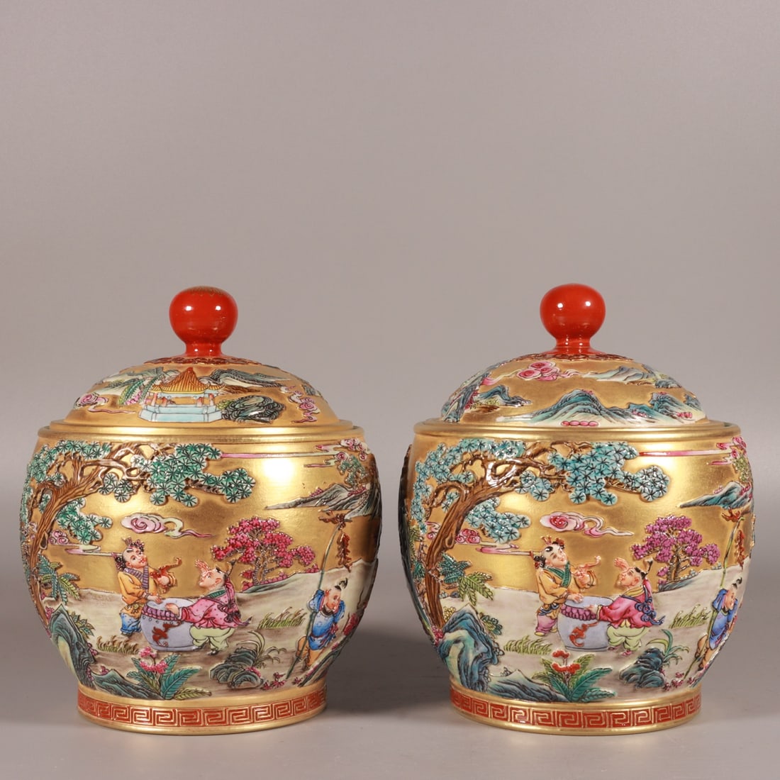 A Pair of Exquisite Enamel Gold Ground Landscape and Figure Pattern Tea Caddys (1 of 9)