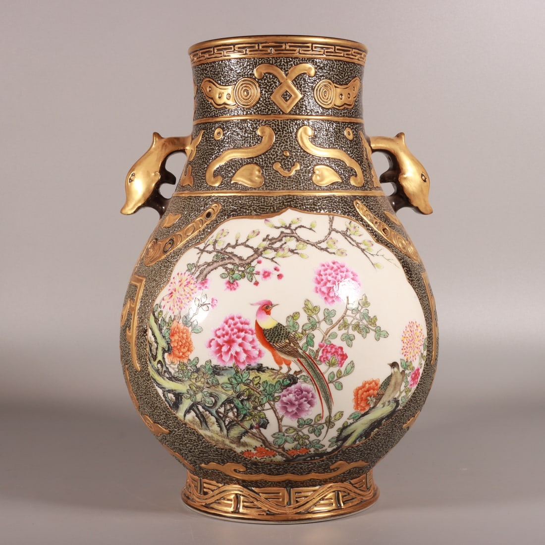 An Exquisite Enamel Black Glazed Painted Gold Flower and Bird Pattern Deer-Ears Vase: An Exquisite Enamel Black Glazed Painted Gold Flower and Bird Pattern Deer-Ears Vase,Qing Dynasty, China,Qianlong Six-character Mark,Size:10.9inx7.5in 