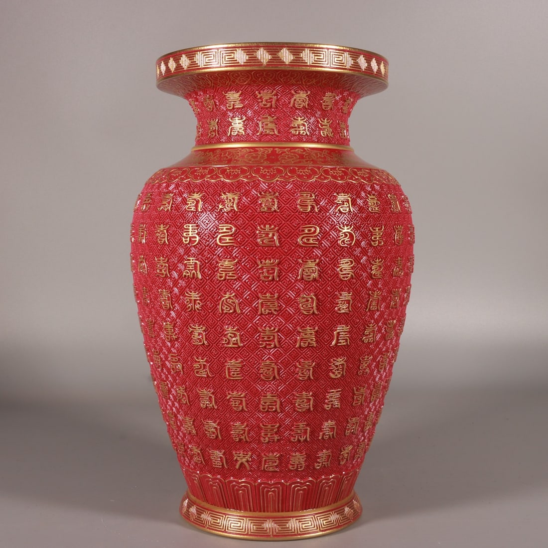 A Rare Ruby Red-Glazed Painted Gold Shou-Character Pattern Vase: A Rare Ruby Red-Glazed Painted Gold Shou-Character Pattern Vase,Qing Dynasty, China,Qianlong Six-character Mark,Size:11.8inx7.5in 