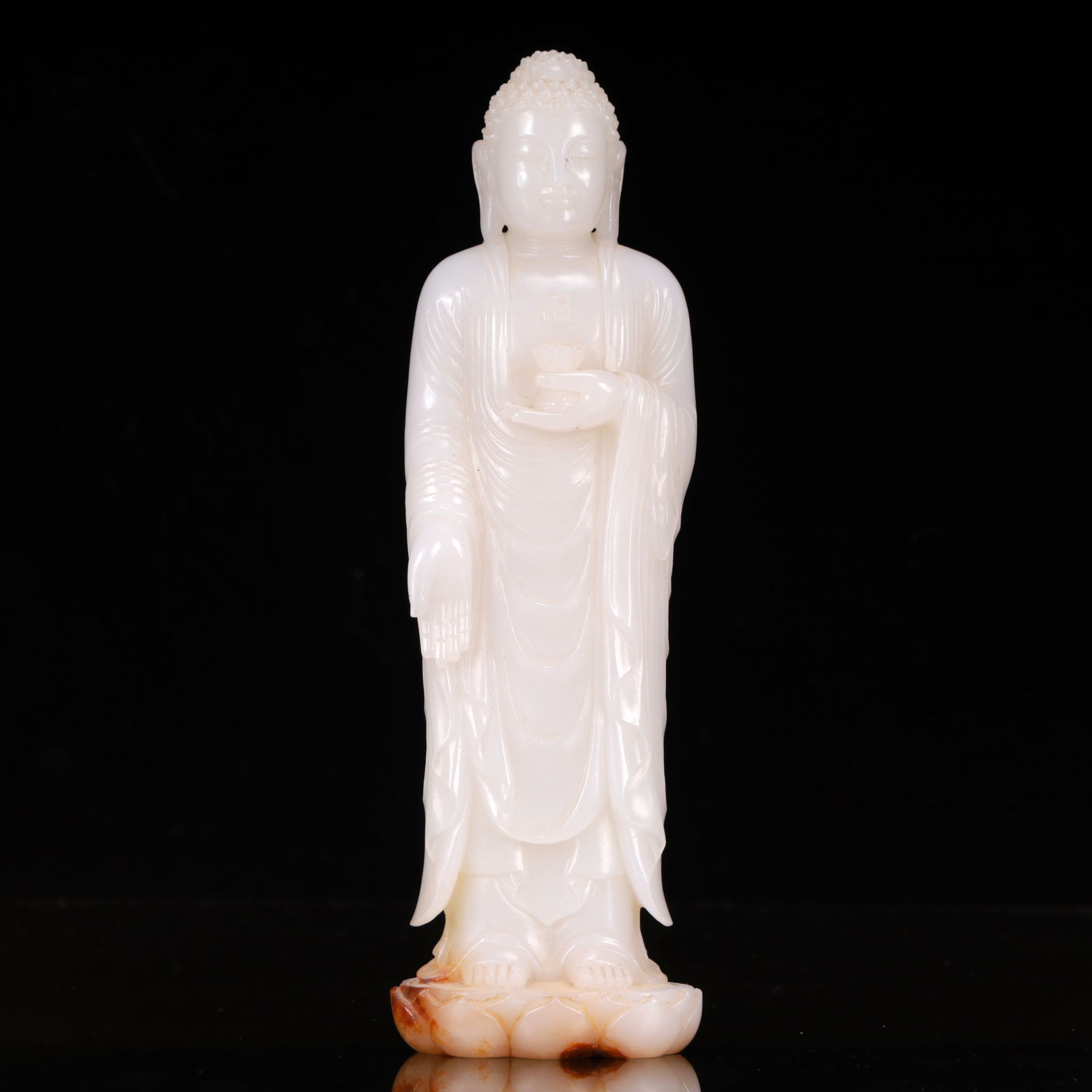 An Exquisite White Jade Statue of Sakyamuni: An Exquisite White Jade Statue of Sakyamuni,Qing Dynasty, China,Size:2.4inx1.6inx8.7in,Weight:849g 白玉如来像,中国清代