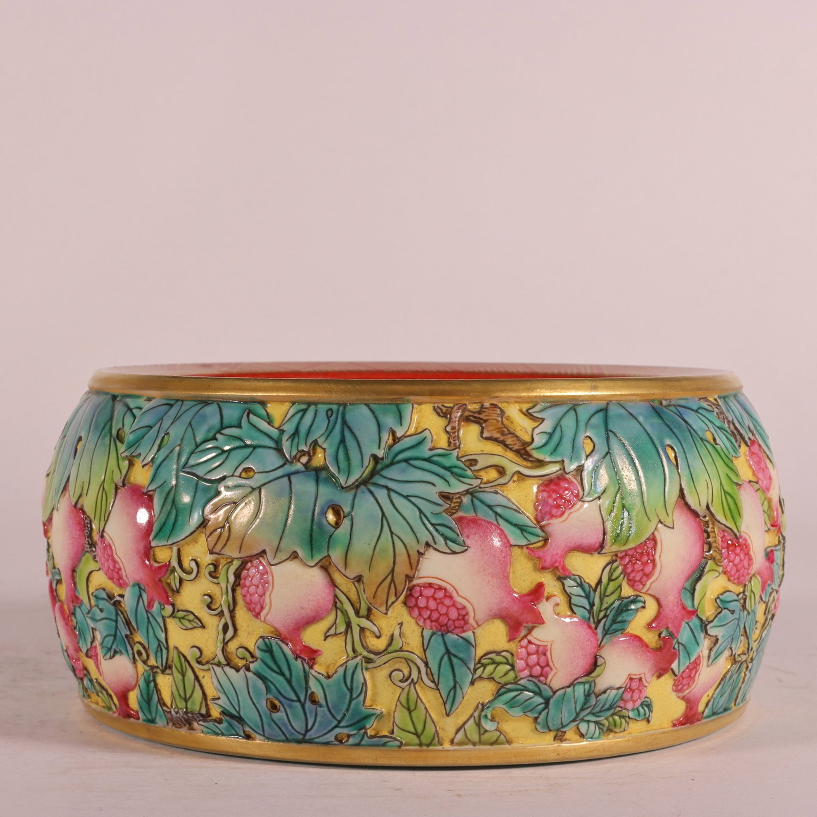 An Exquisite Enamel Yellow Ground Pomegranate and Bird Pattern Ornament: An Exquisite Enamel Yellow Ground Pomegranate and Bird Pattern Ornament,Qing Dynasty, China,Qianlong Four-character Mark,Size:2.6inx5.1in 