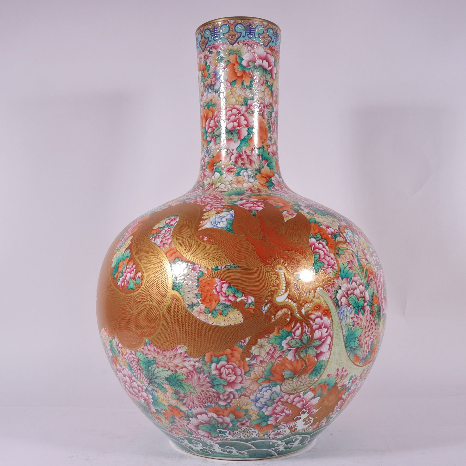 A Huge Enamel Painted Gold Flower and Dragon Pattern Vase: A Huge Enamel Painted Gold Flower and Dragon Pattern Vase,Qing Dynasty, China,Qianlong Four-character Mark,Size:22inx4.6inx13.8inx7.1in 