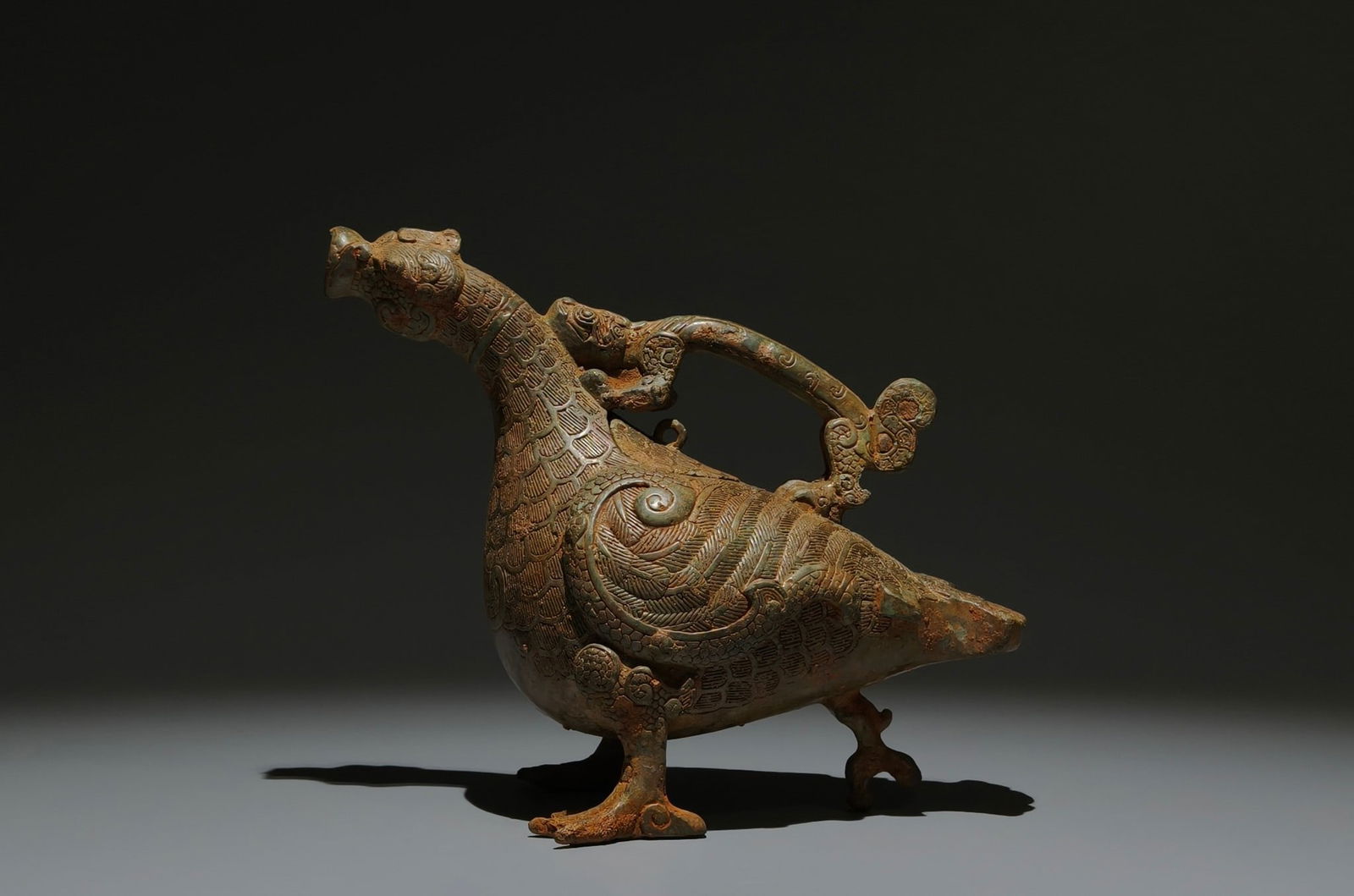 An Archaic Bronze Bird-Shaped Zun: An Archaic Bronze Bird-Shaped Zun,the Spring and Autumn in Period in China,Size:6.3inx7.7inx4.3in 青铜鸟形尊,中国春秋时期