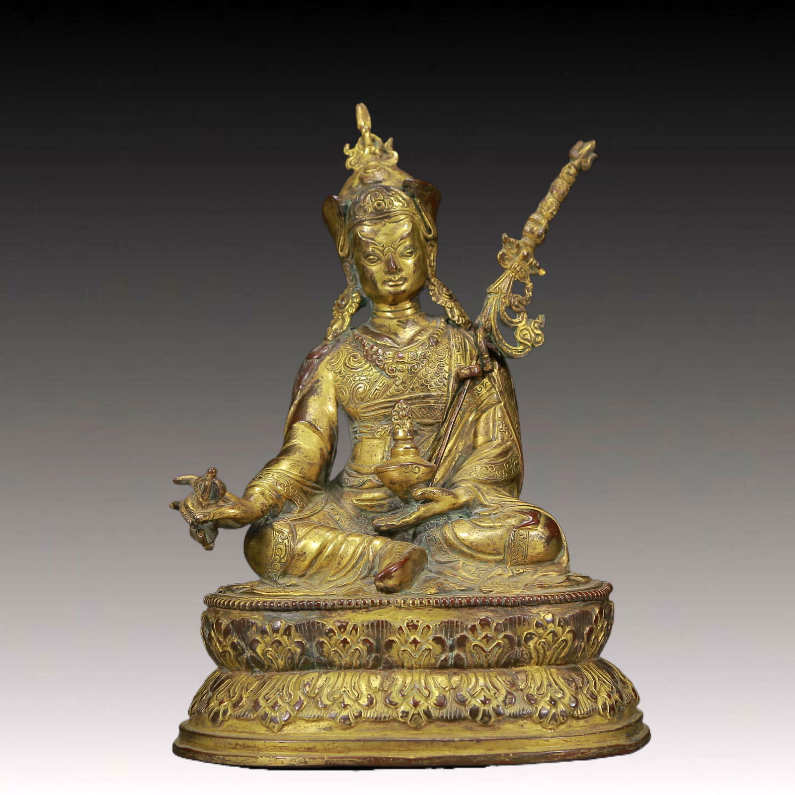 A Solemn Gilt Bronze Statue of Padma Sambhava: A Solemn Gilt Bronze Statue of Padma Sambhava,Ming Dynasty, China,Size: 6.3inx5.1inx9.1in,Weight:2135g 铜鎏金莲花生大士像，明代