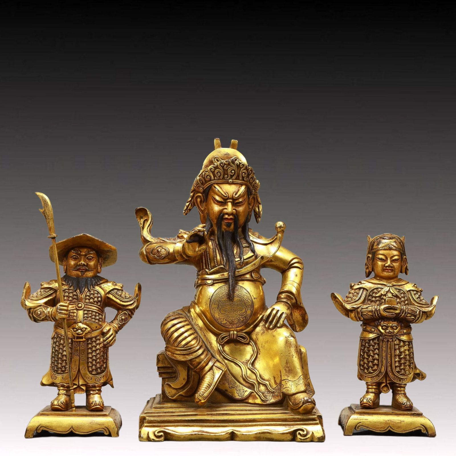 A Set of Solemn Gilt Bronze Statue of ‘Guan Gong’: A Set of Solemn Gilt Bronze Statue of ‘Guan Gong’,Ming Dynasty, China,Size:5.7inx3.9inx9.4in,Total Weight:5250g 