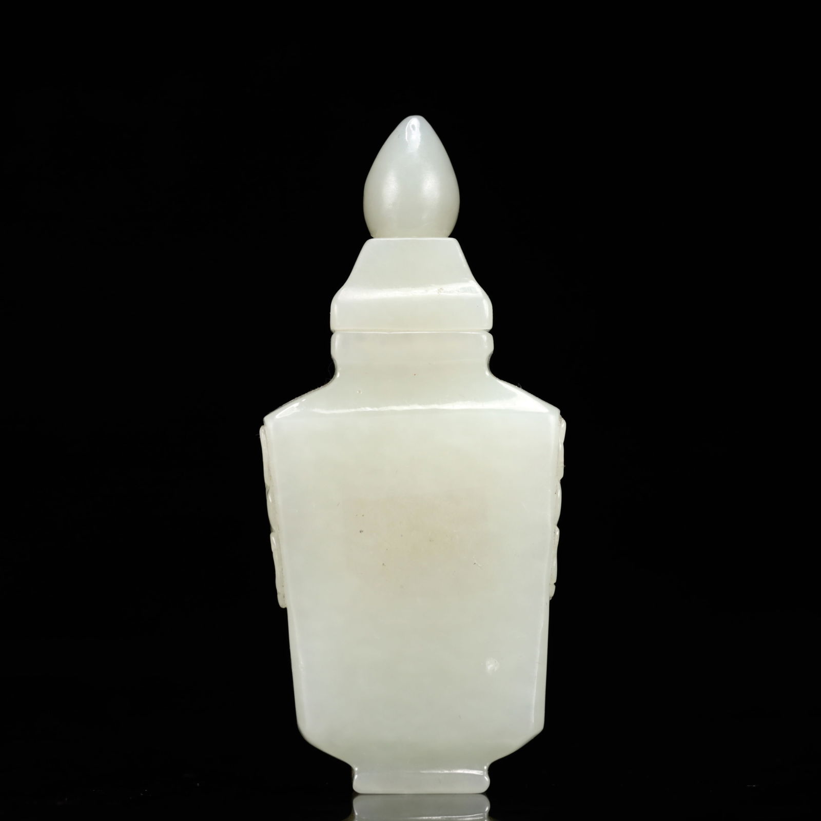 An Exquisite White Jade Beast-Face Pattern Snuff Bottle: An Exquisite White Jade Beast-Face Pattern Snuff Bottle,Qing Dynasty, China,Size:1.4inx0.8inx3.1in,Weight:75g 