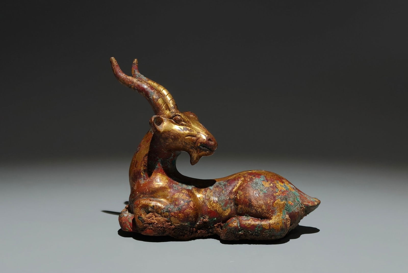 An Exquisite Gilt Bronze Sheep Ornament: An Exquisite Gilt Bronze Sheep Ornament,Han Dynasty,China,Size:4.9inx5.5inx2.6in 铜鎏金羊摆件,中国汉代