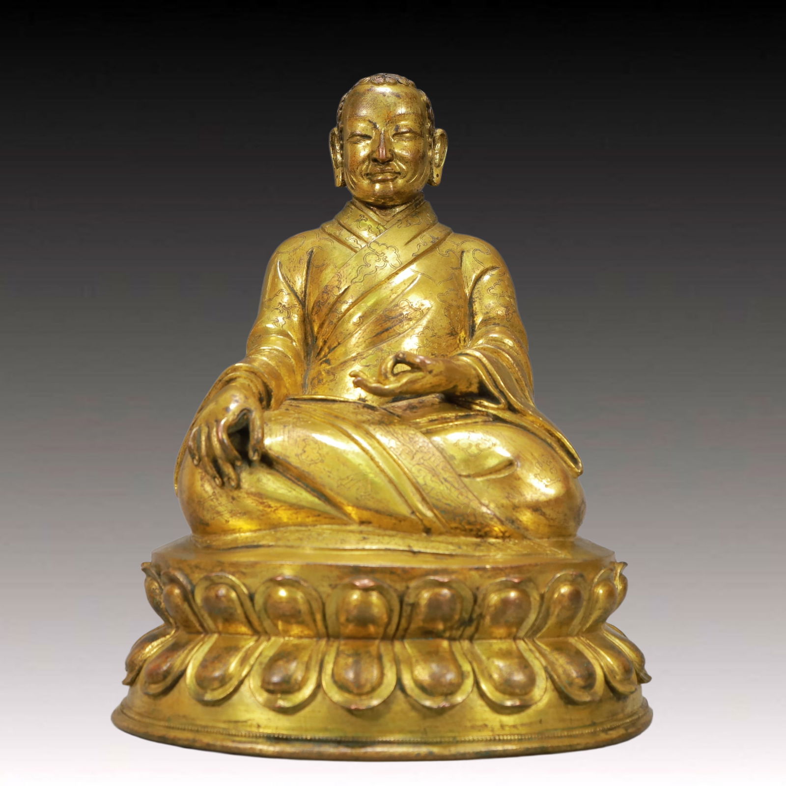A Solemn Gilt Bronze Statue of Guru: A Solemn Gilt Bronze Statue of Guru,Ming Dynasty, China,Size:9.1inx7.9inx11.6in,Weight:5750g 铜鎏金上师像,中国明代