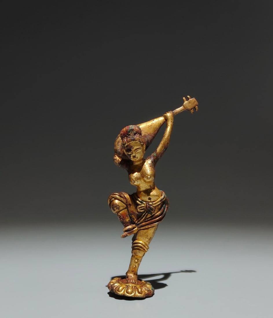 An Exquisite Gilt Bronze Figure Ornament: An Exquisite Gilt Bronze Figure Ornament,Tang Dynasty,China,Size:4.9inx2inx0.8in 铜鎏金人物摆件,中国唐代
