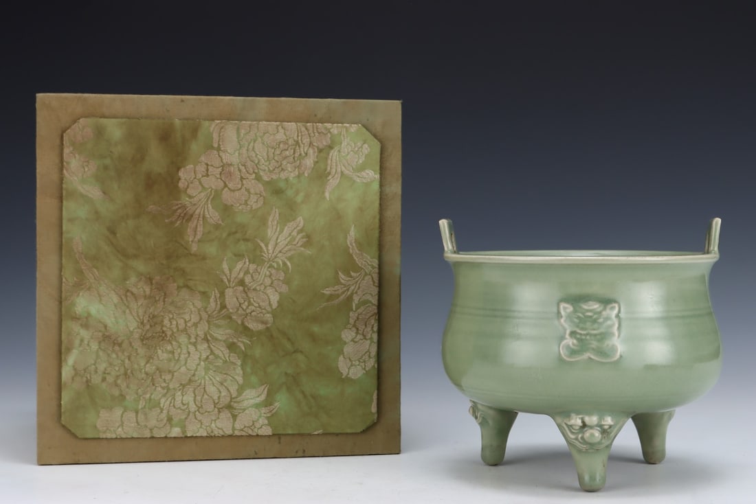An Exquisite Longquan yao Celadon Glazed Beast-Face Pattern Double-Ears Tripod Censer: An Exquisite Longquan yao Celadon Glazed Beast-Face Pattern Double-Ears Tripod Censer,Song Dynasty, China,Size:5.8inx6.5in 