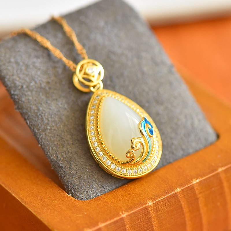 An Exquisite Sterling Silver-Gold Plated Inlaid White Jade Enamel Pendant,Inlaid Diamonds: An Exquisite Sterling Silver-Gold Plated Inlaid White Jade Enamel Pendant,Inlaid Diamonds,Size:10mmx15mm 