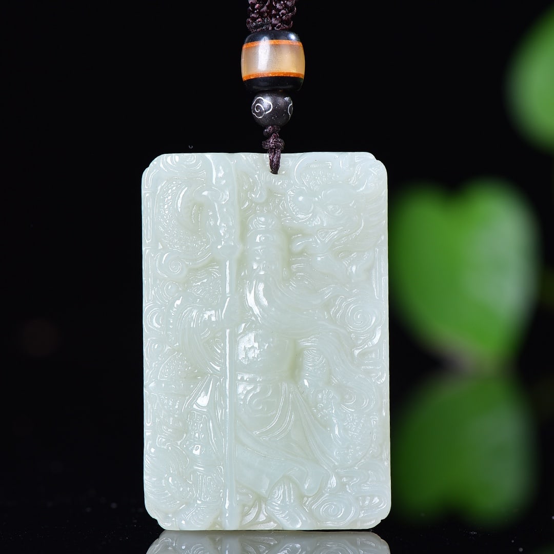 An Exquisite White Jade Guangong and Dragon Pattern Pendant: An Exquisite White Jade Guangong and Dragon Pattern Pendant,Size:38mmx57mm 寓意:保佑平安的护法珈蓝,佩戴关公,&#
