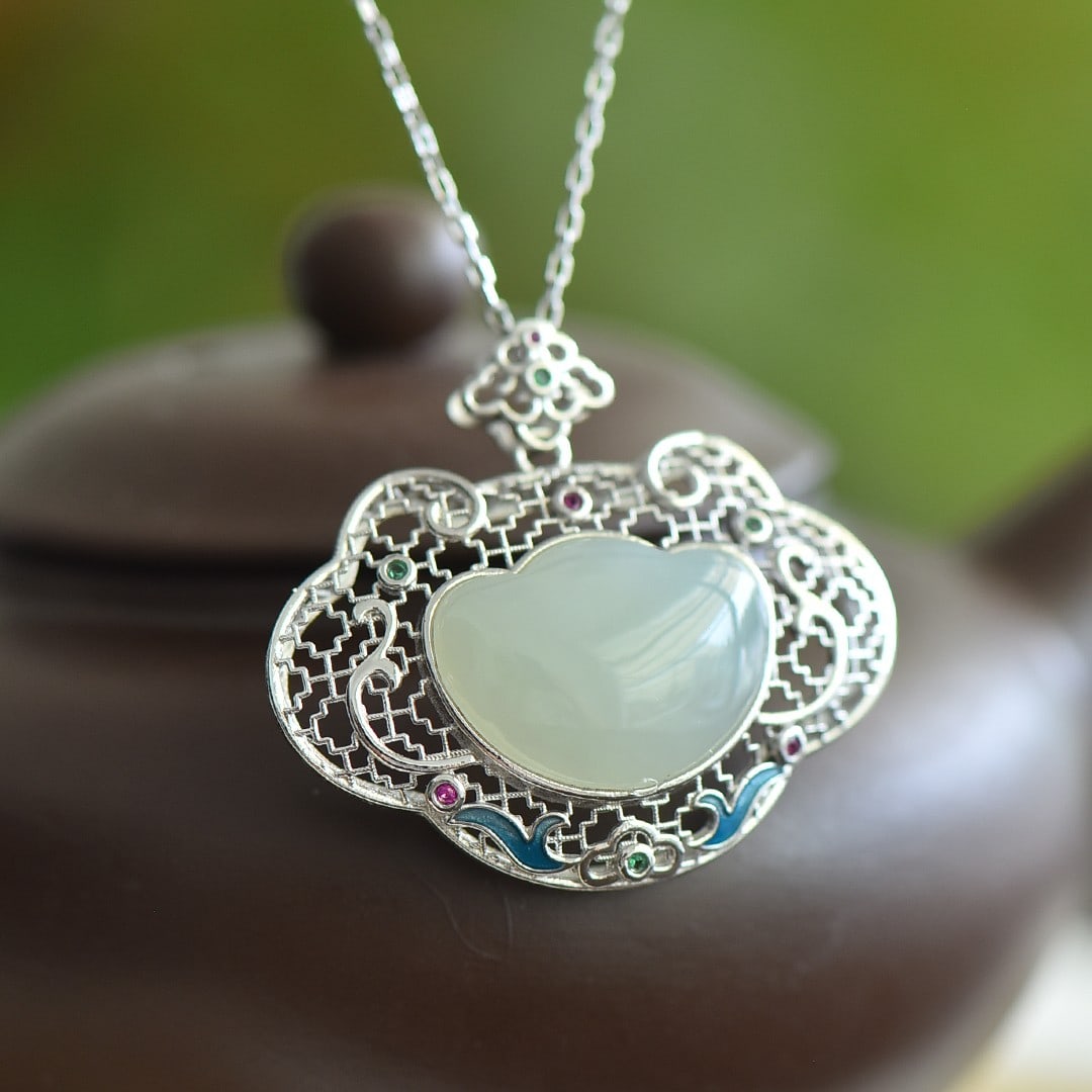 An Exquisite Sterling Silver Inlaid White Jade Pendant: An Exquisite Sterling Silver Inlaid White Jade Pendant 纯银镶白玉吊坠
